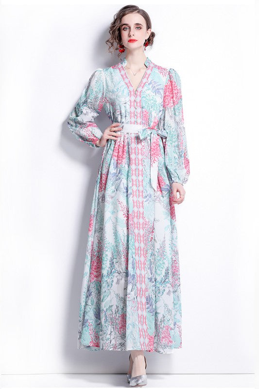 Discover the Boho Floral Maxi Dress with Belted V-Neck, featuring a stunning floral print perfect for any occasion.