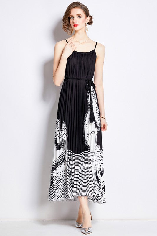 Sleeveless boho maxi dress with pleated skirt, belted waist, stretch fabric, and round neckline for elegant summer style model display product image 7