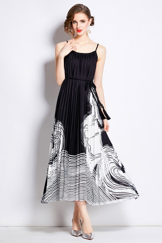 Sleeveless boho maxi dress with pleated skirt, belted waist, stretch fabric, and round neckline for elegant summer style model display product image 4