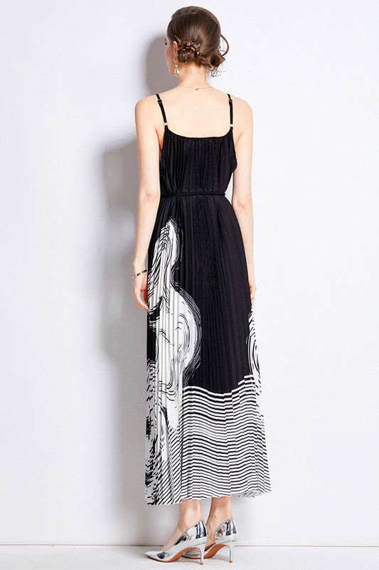 Sleeveless boho maxi dress with pleated skirt, belted waist, stretch fabric, and round neckline for elegant summer style model display product image 3